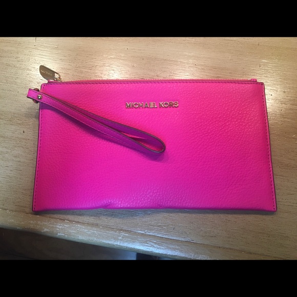 Michael Kors Handbags - Michael Kors clutch 9.75” x 5.5”